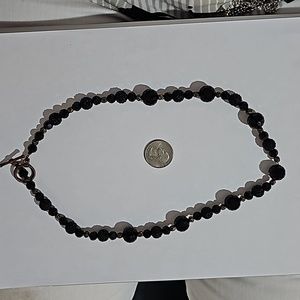 Black sparkle and gold tone bead necklace